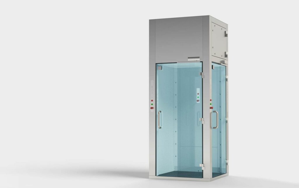 Decontamination misting shower for cleanroom personnel with glass doors and stainless steel enclosure